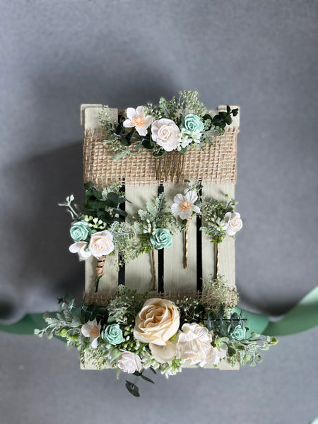 Sage green and white boutonniere