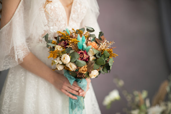 Autumn wedding bouquet with roses