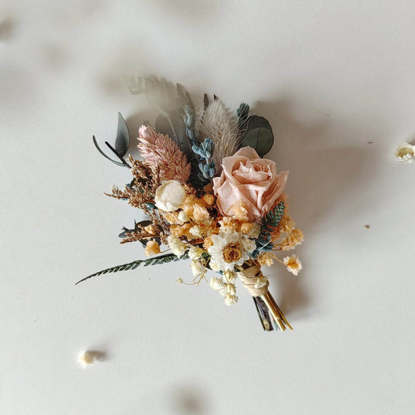 Blush groom's boutonniere