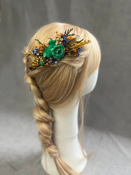 Emerald and golden hair comb