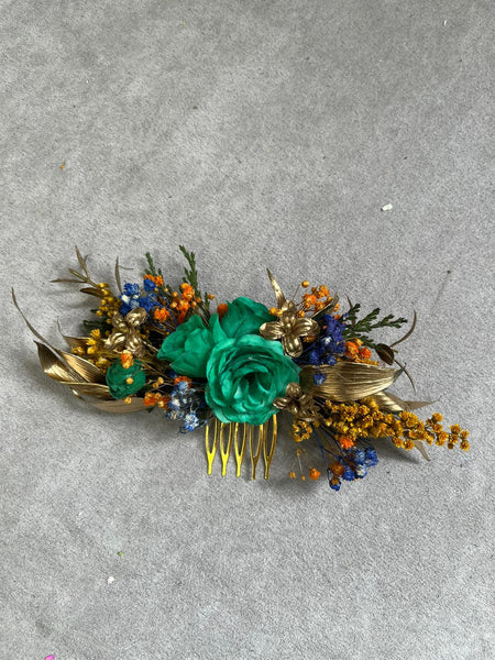 Emerald and golden hair comb