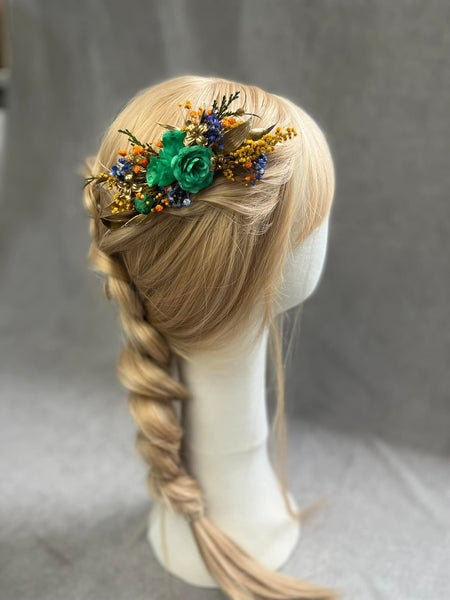 Emerald and golden hair comb