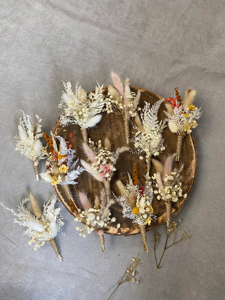 Natural boho rustic boutonnieres