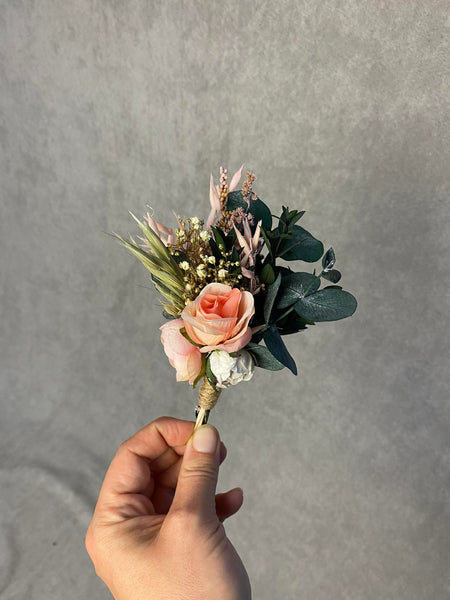 Pink and peach flower boutonniere