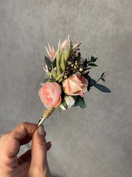 Pink and peach flower boutonniere