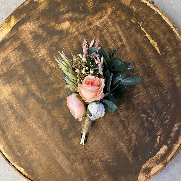 Pink and peach flower boutonniere