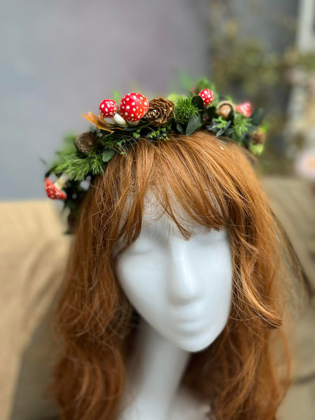 Woodland flower half wreath with red mushrooms