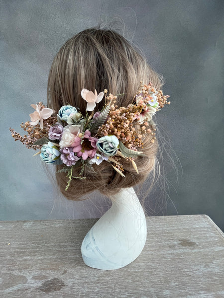 Bridal hair arrangement in pastel colours