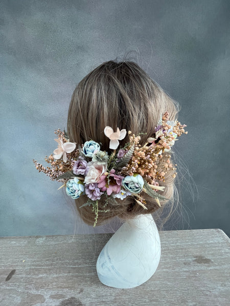 Bridal hair arrangement in pastel colours