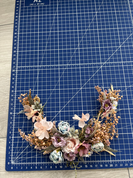 Bridal hair arrangement in pastel colours
