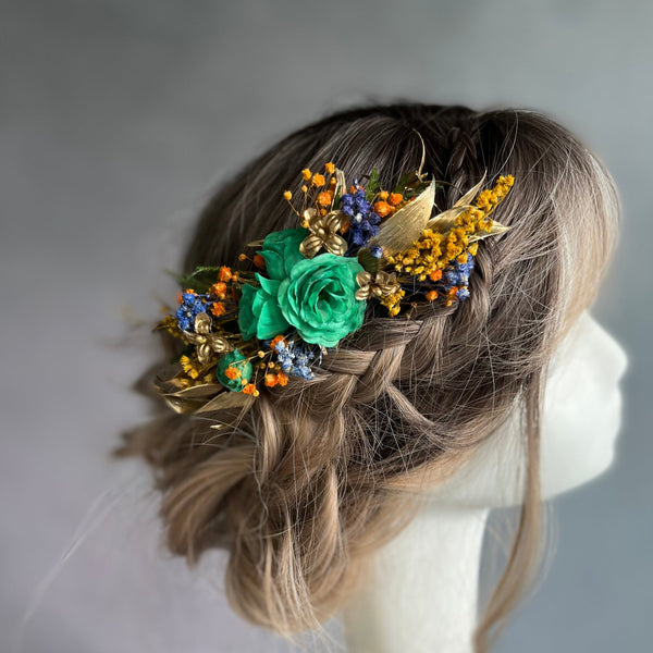 Emerald and golden hair comb