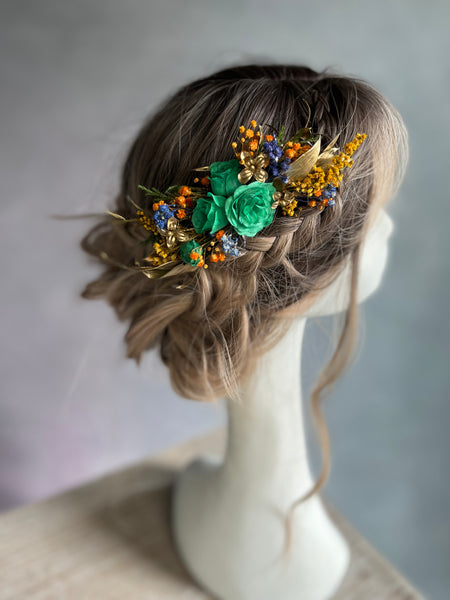 Emerald and golden hair comb