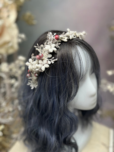 Winter flower half wreath with rose hips