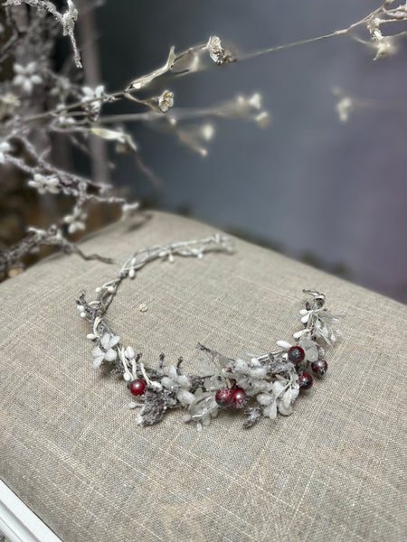 Winter flower half wreath with rose hips