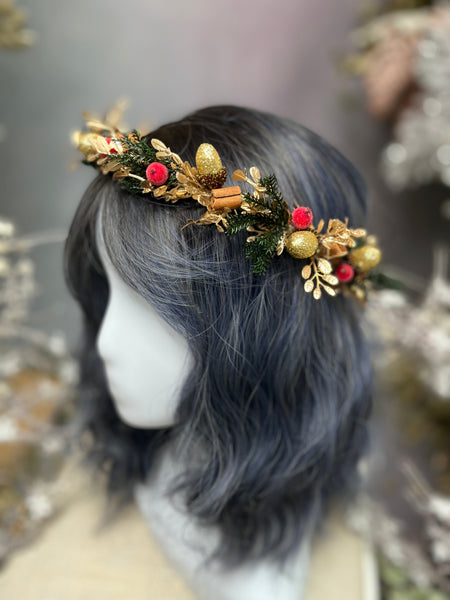 Golden Christmas flower wreath with cinnamon