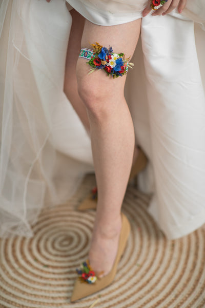 Folk bridal garter with poppy and daisy