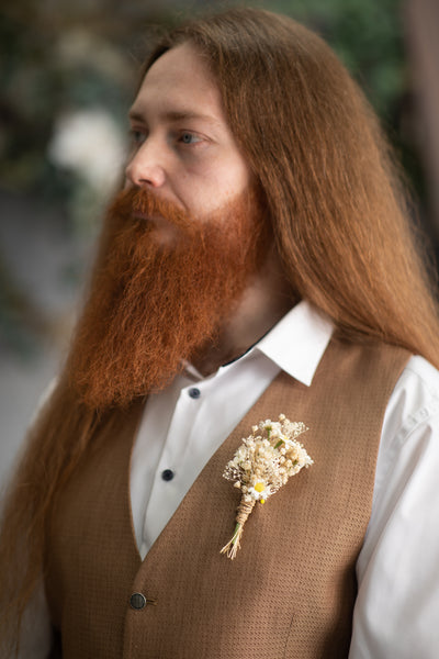 Ivory daisy flower boutonniere