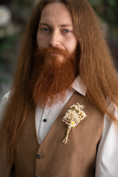 Ivory daisy flower boutonniere