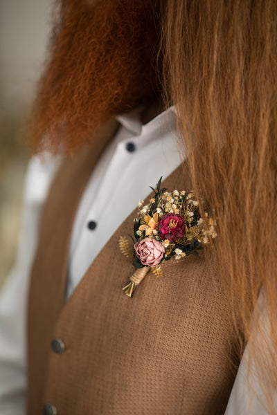 Dusty pink and burgundy boutonniere