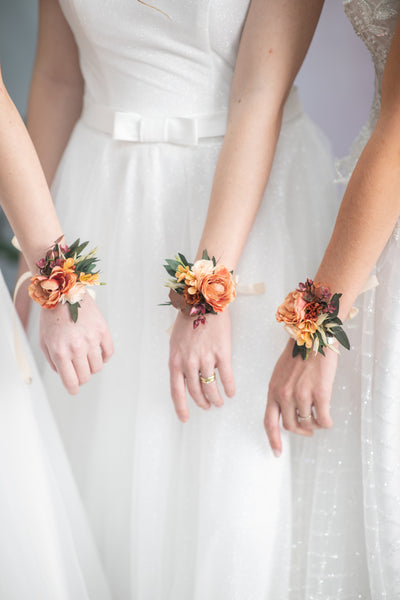 Orange bracelets for bride/bridesmaids