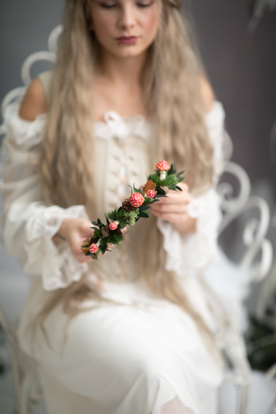 Woodland flower half wreath with red mushrooms
