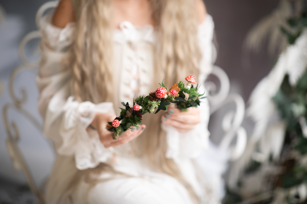 Woodland flower half wreath with red mushrooms