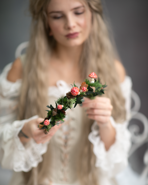 Woodland flower half wreath with red mushrooms