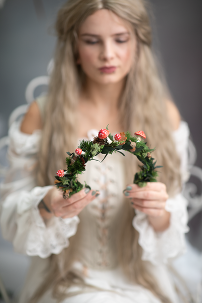 Woodland flower half wreath with red mushrooms