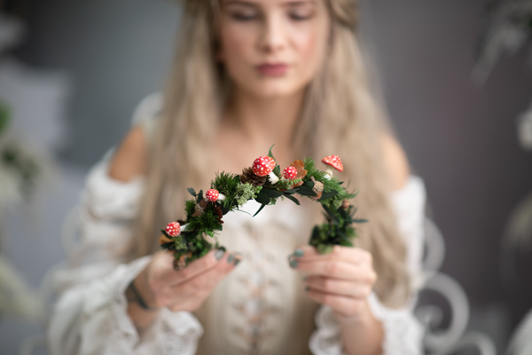 Woodland flower half wreath with red mushrooms