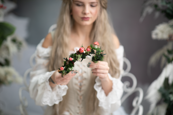 Woodland flower half wreath with red mushrooms