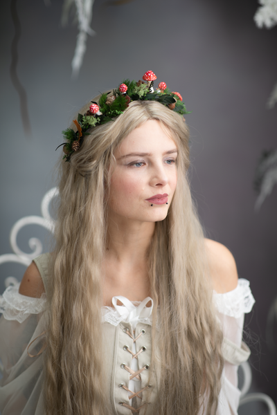 Woodland flower half wreath with red mushrooms