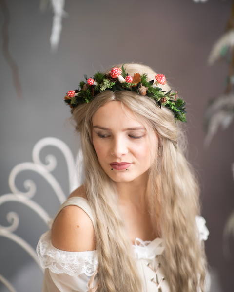 Woodland flower half wreath with red mushrooms