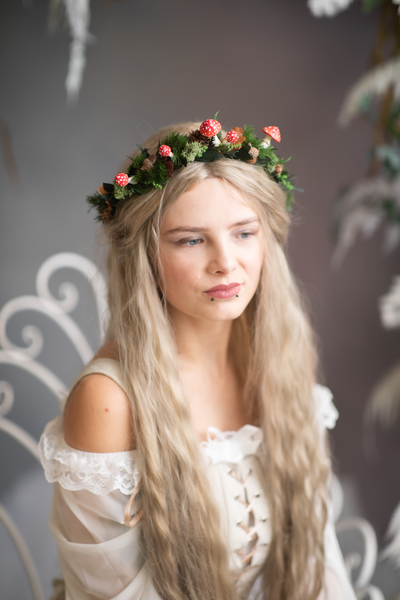 Woodland flower half wreath with red mushrooms