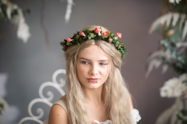 Woodland flower half wreath with red mushrooms