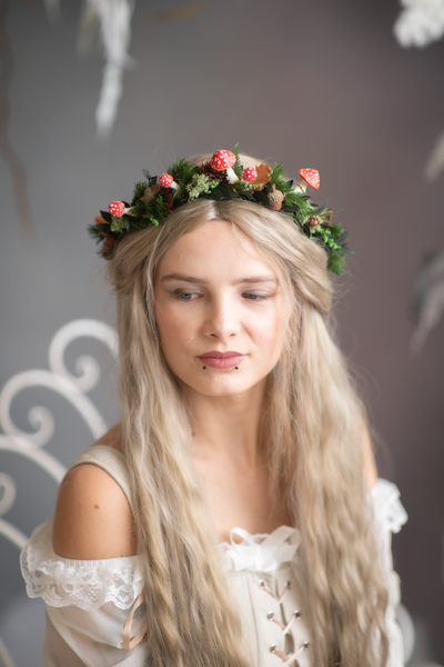Woodland flower half wreath with red mushrooms