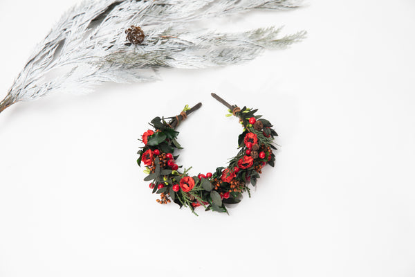 Flower headband with pine cones and berries