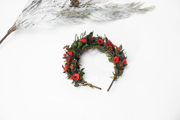 Flower headband with pine cones and berries