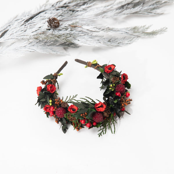 Flower headband with pine cones and berries