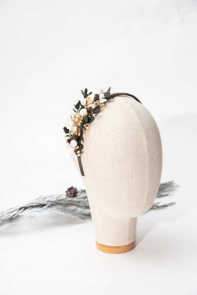 Winter flower headband with pine cones