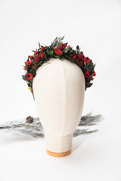 Flower headband with pine cones and berries