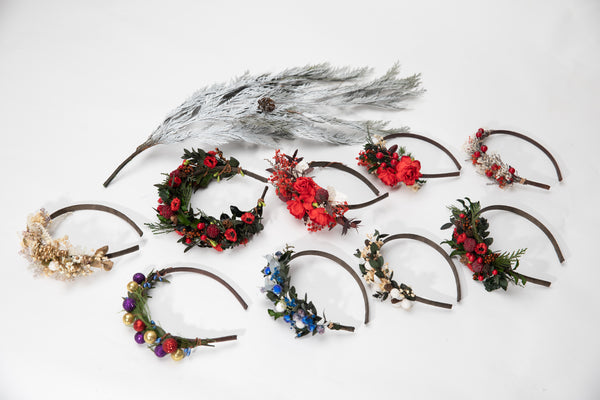 Flower headband with pine cones and berries