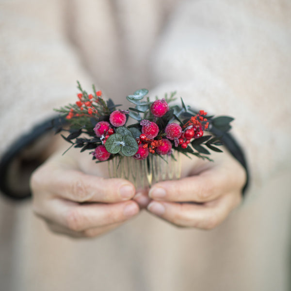 Winter hair comb with frozen berries