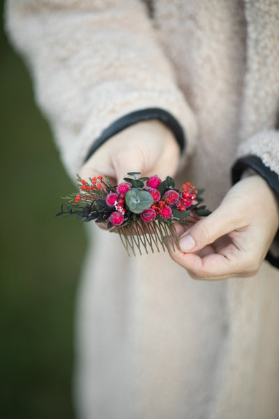 Winter hair comb with frozen berries