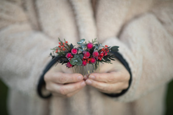 Winter hair comb with frozen berries