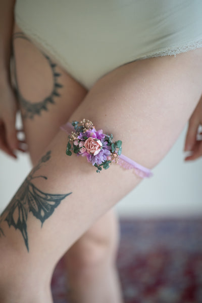 Romantic purple flower bridal garter