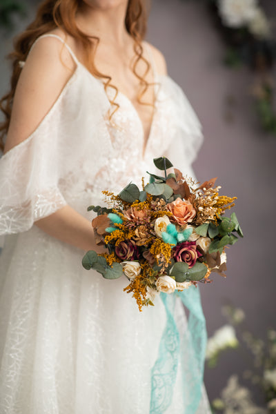Autumn wedding bouquet with roses