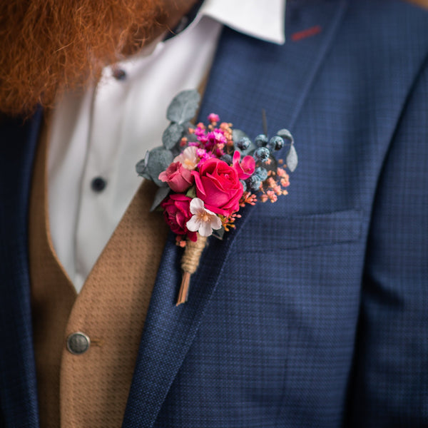 Pink and magenta flower boutonniere