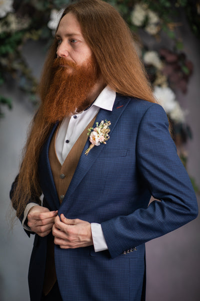 Blush flower boutonniere for groom