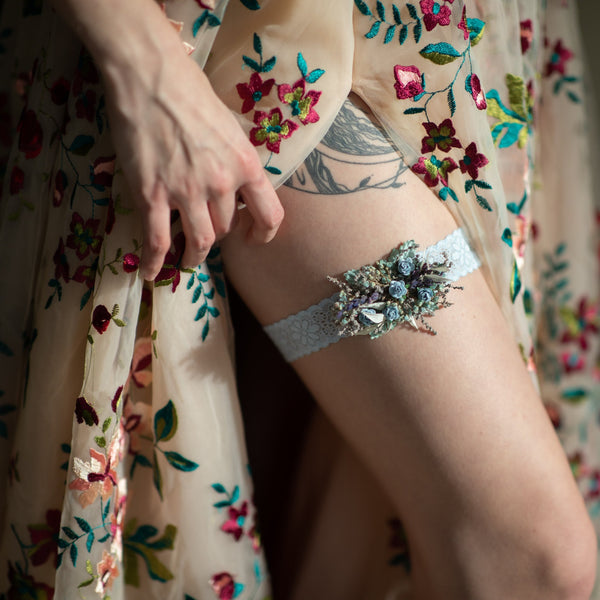 Bridal flower garter with blue roses