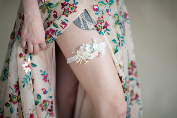 Romantic blush and white bridal garter